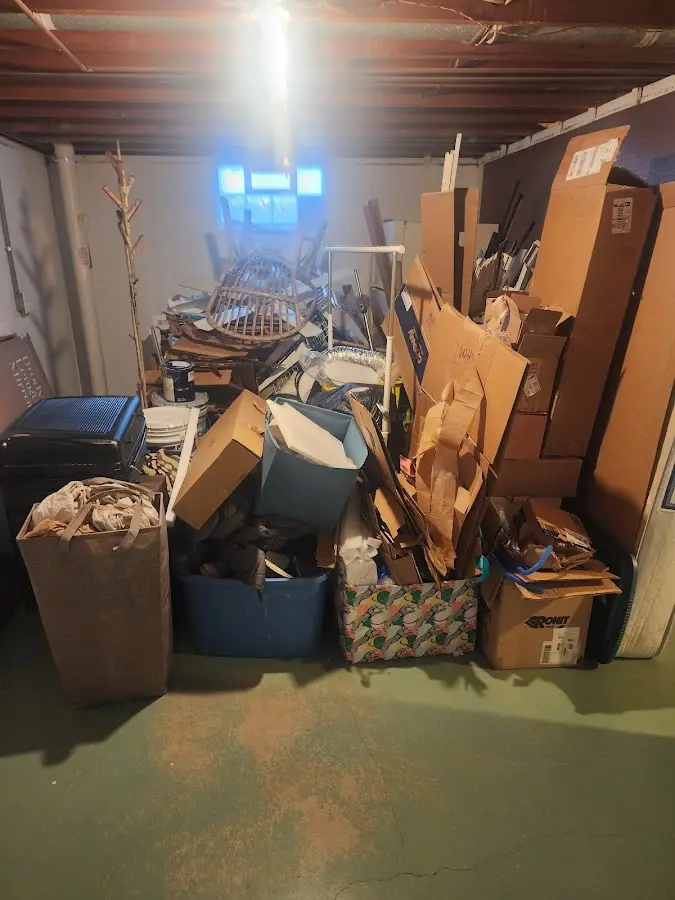 Roll-off dumpster container at job site for Yard Waste Dumpster Rental in Havre de Grace